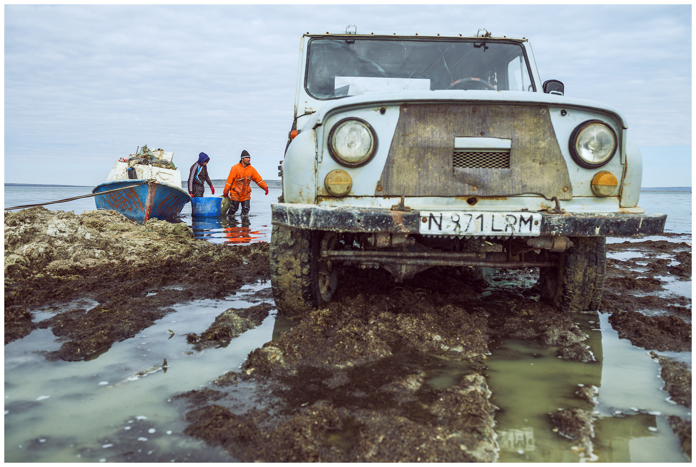 Fishermen unload their catch