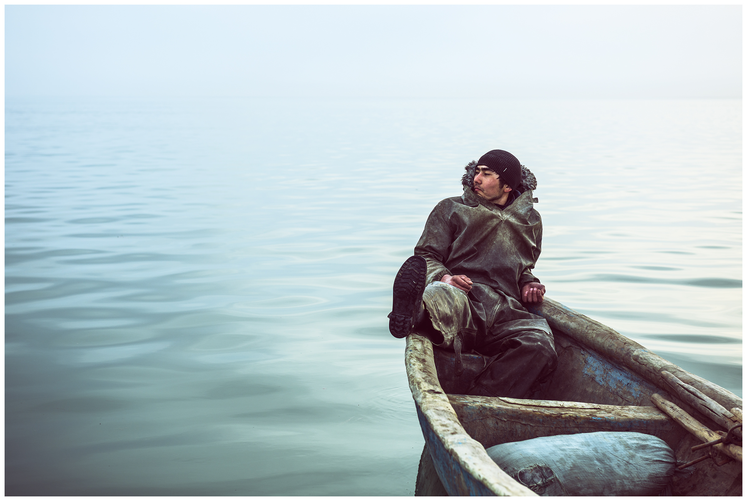 A fisherman from the fishing village Bogen takes a break in his boat