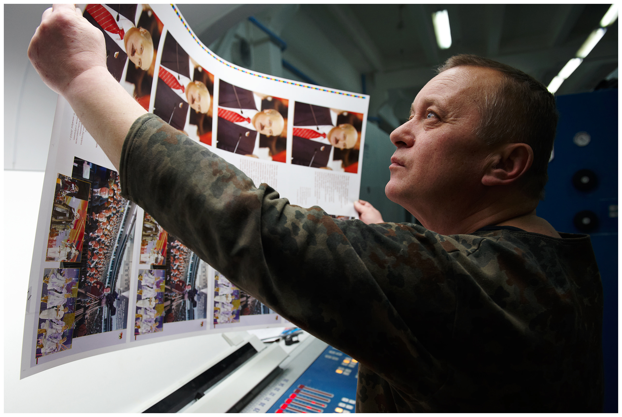 Minsk, Belarus, the publishing house "Pechatny Combinat". A printer watches the propaganda production for the election campaign of Belarusian President Alexander Lukashenko.
