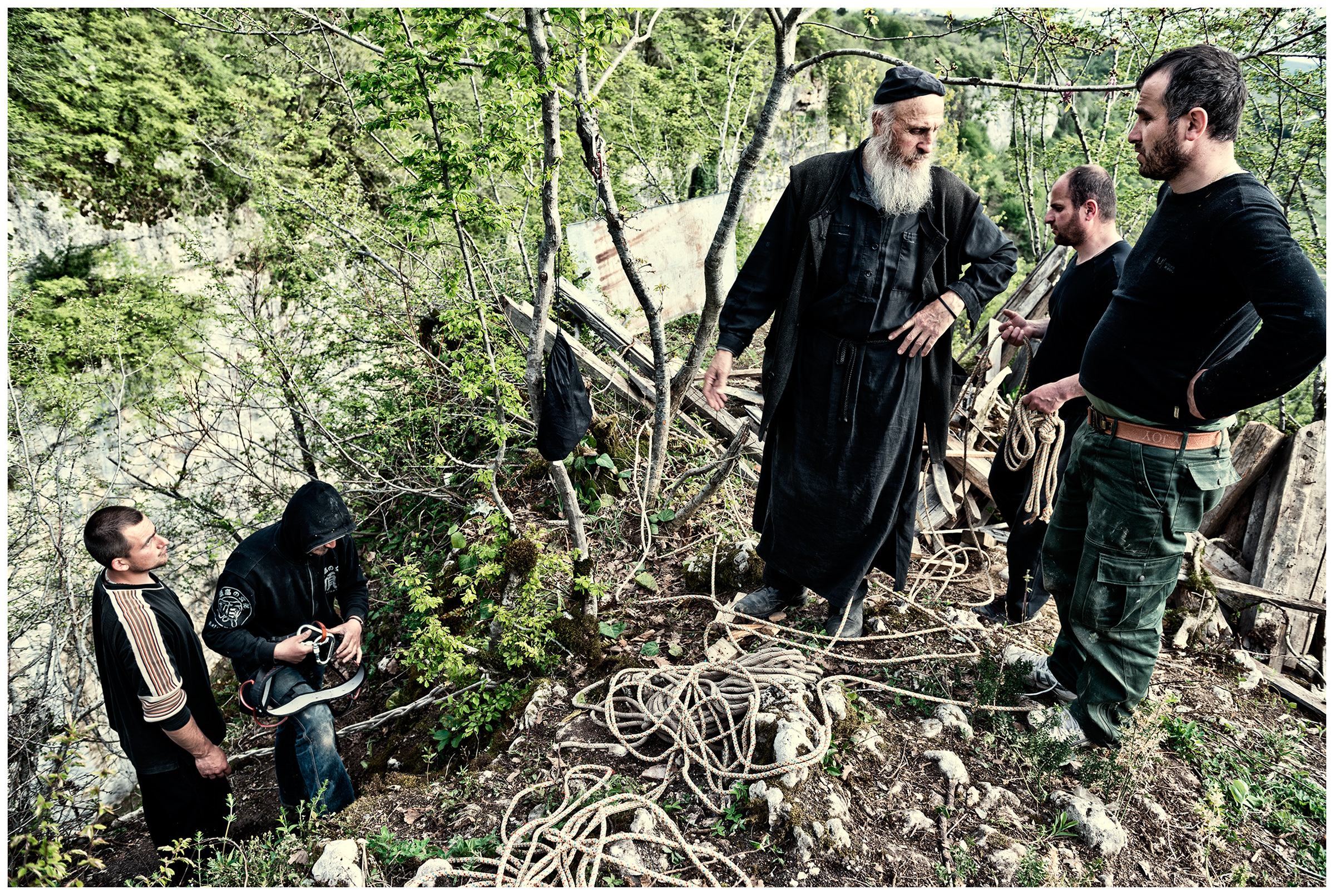 Imereti, Georgia. The Georgian monk Maxime Kavtaradze and his friends build a house on a rock.