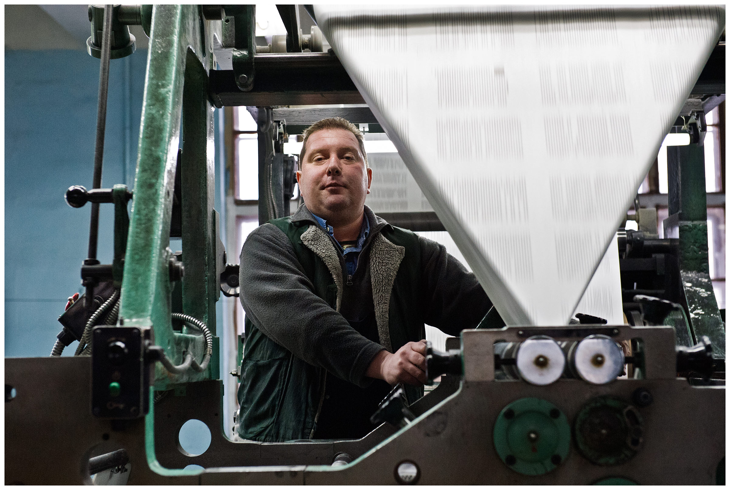 Minsk, Belarus, the publishing house "Pechatny Combinat". A printer at his workplace prints a magazine.