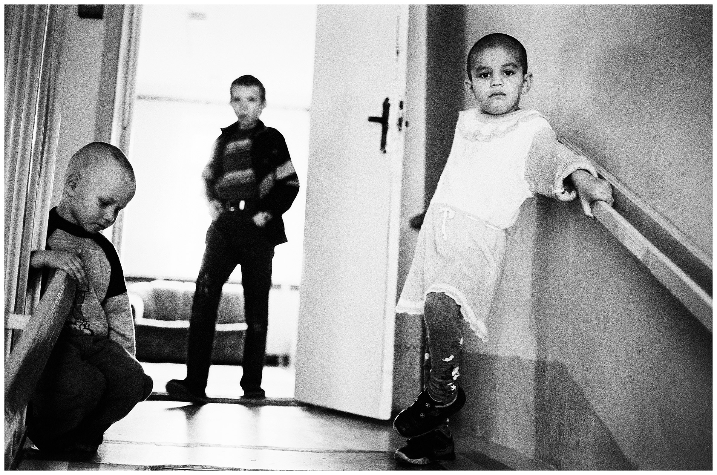Minsk, Belarus. Children play in the staircase of a children's home, where many victims of child trafficking are accommodated.