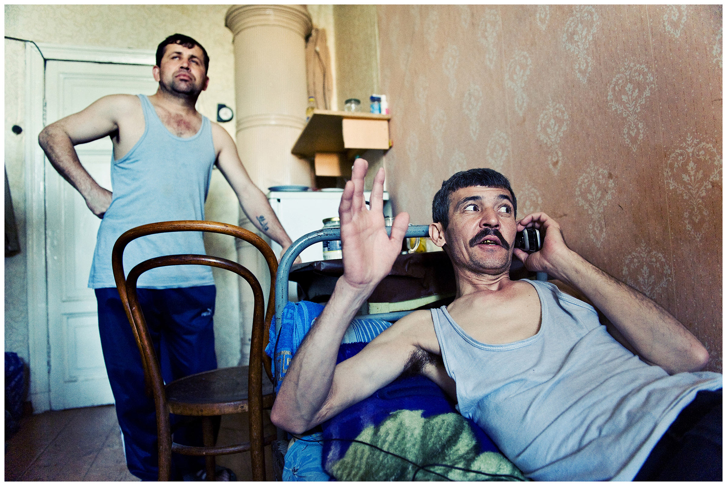 Saint Petersburg, Russia. The Uzbek guest workers relax in their rented apartment.