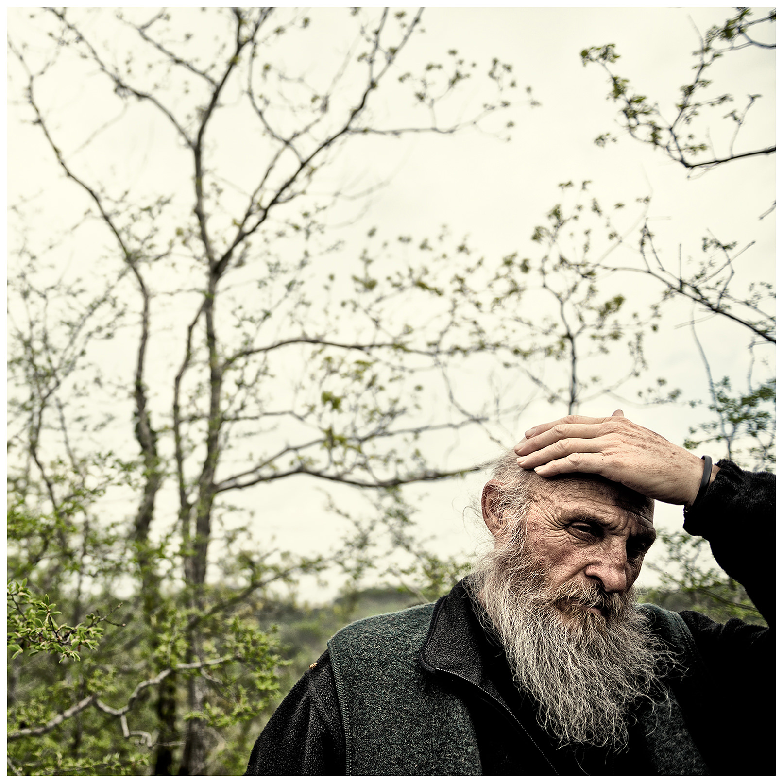Imereti, Georgia. The Georgian monk Maxime Kavtaradze stands on a rock.