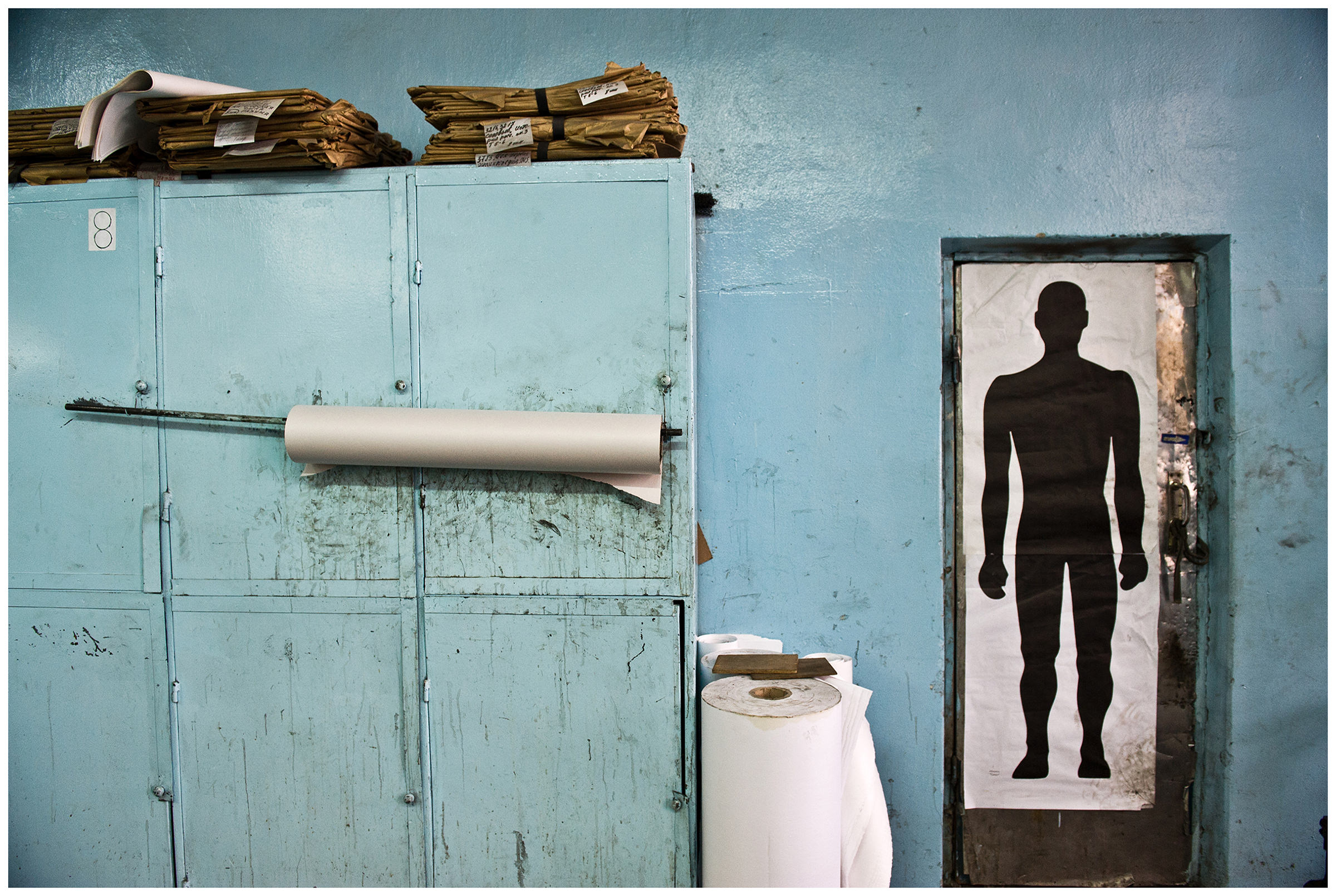 Minsk, Belarus, the publishing house "Pechatny Combinat". Old printing plates pile up on a cupboard.