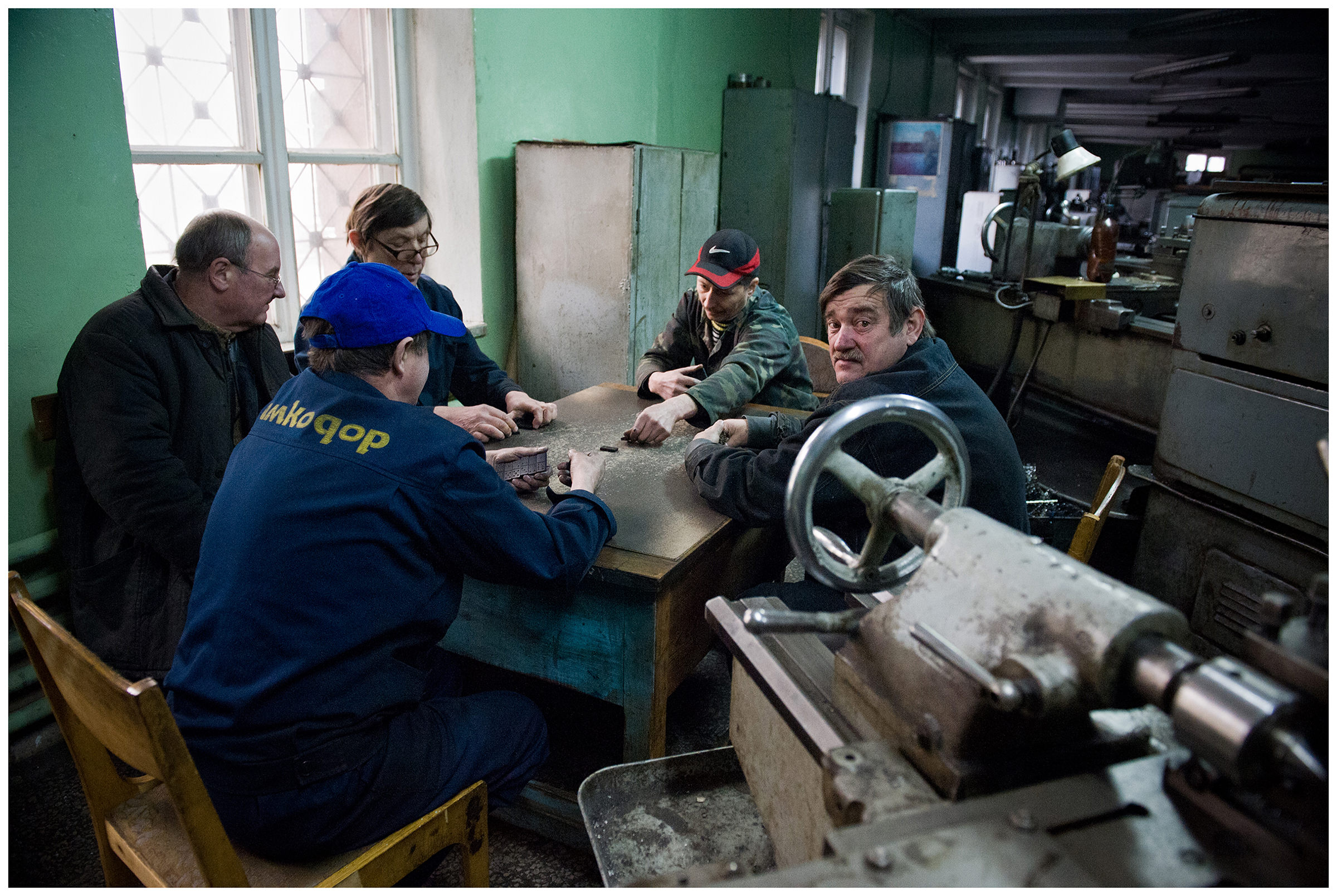 Minsk, Belarus, the publishing house "Pechatny Combinat". The workers of the repair department take a break and play dominoes.