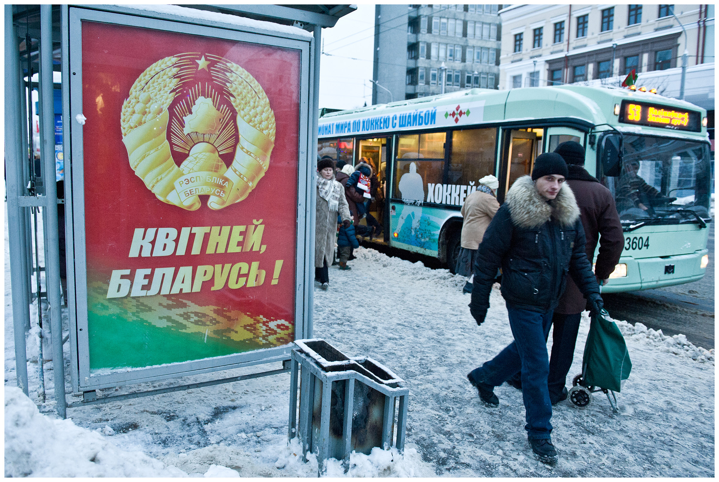 Minsk, Belarus. A poster with the Belarusian symbolism is hanging at a bus stop.