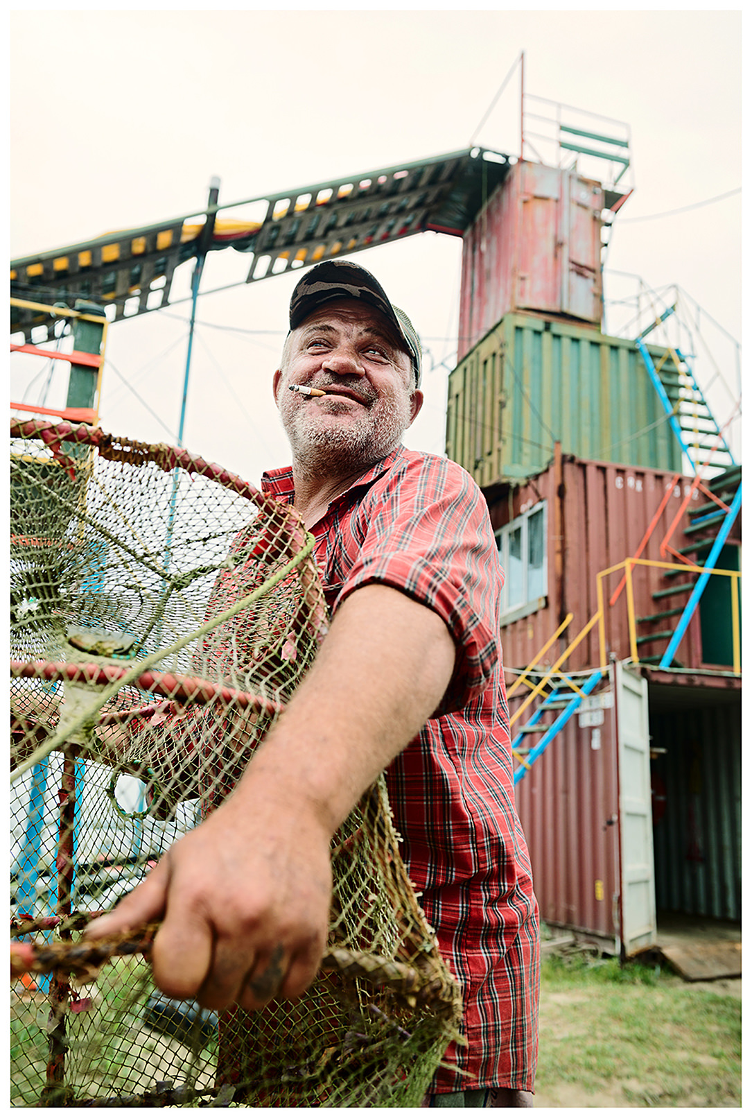 Prymorye, Russia. A poacher carries grave traps.