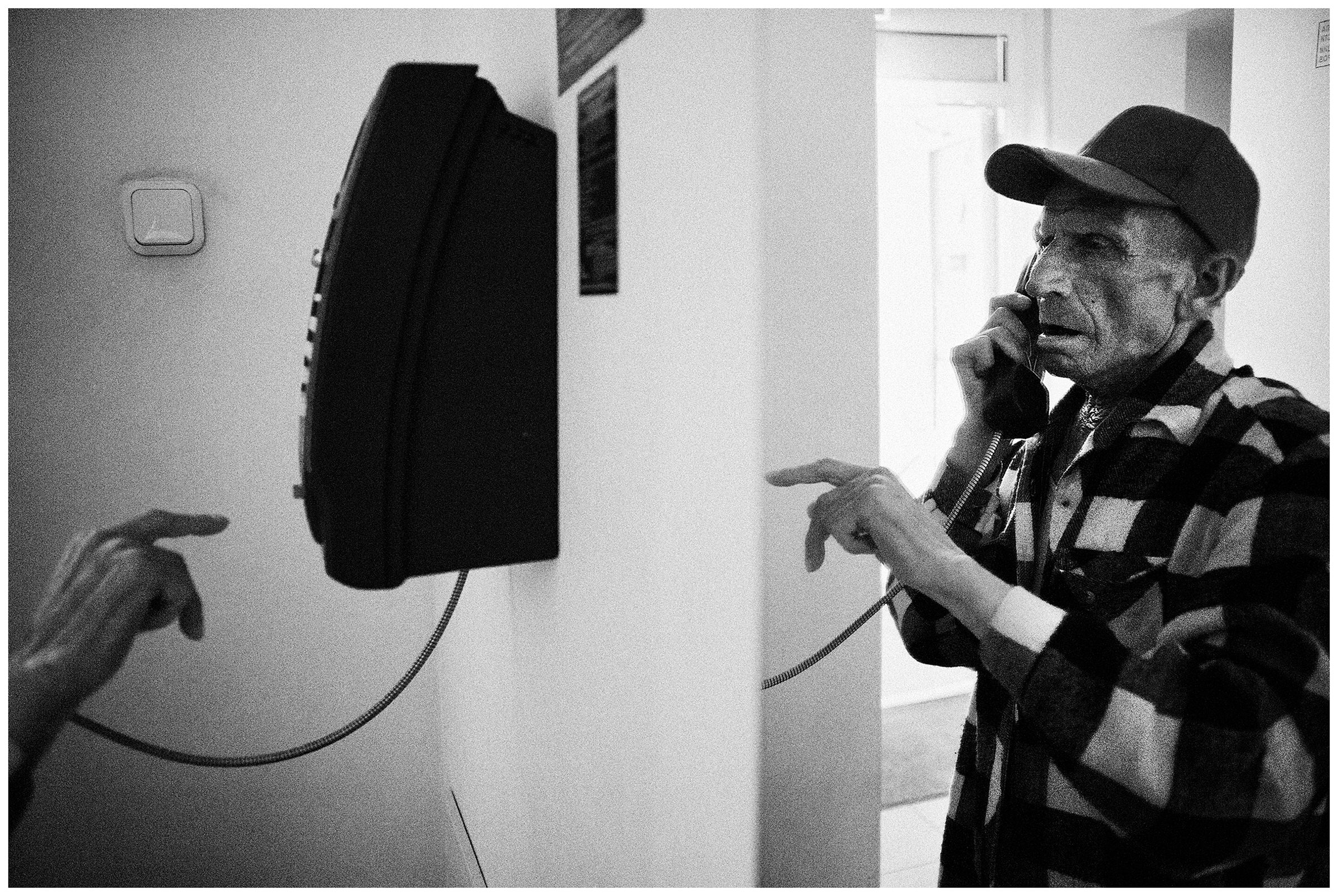 Minsk Hospice, Minsk, Belarus. A patient calls his family.