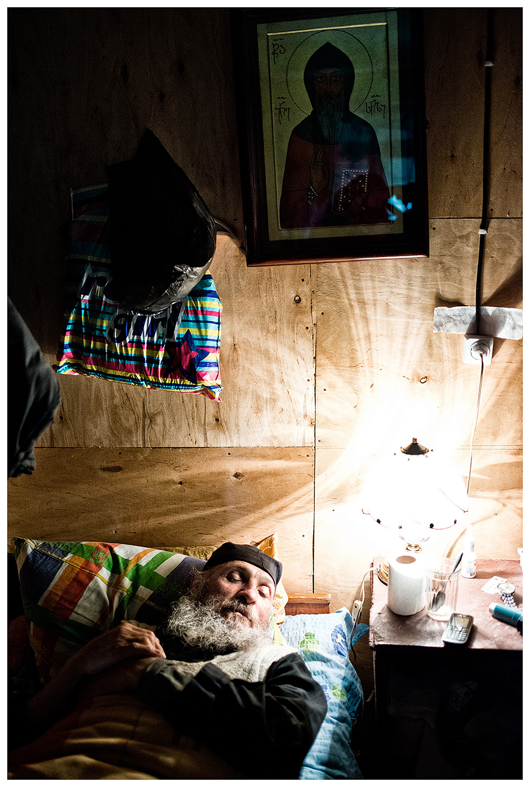 Imereti, Georgia. The Georgian monk Maxime Kavtaradze sleeps in his house on a rock.
