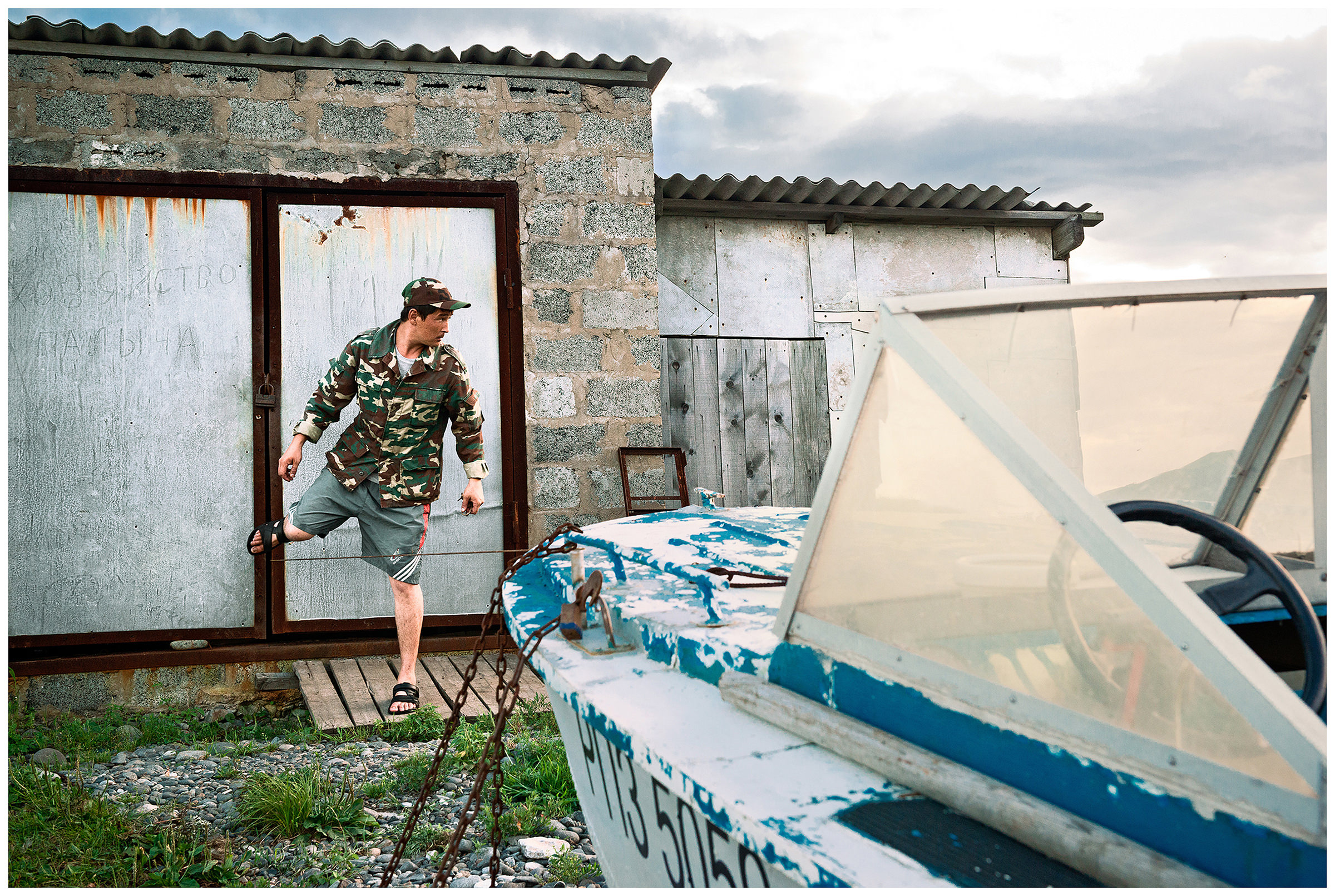 Pemzovaya Bay, Primorye, Russia. A nature conservation inspector closes a storage room.