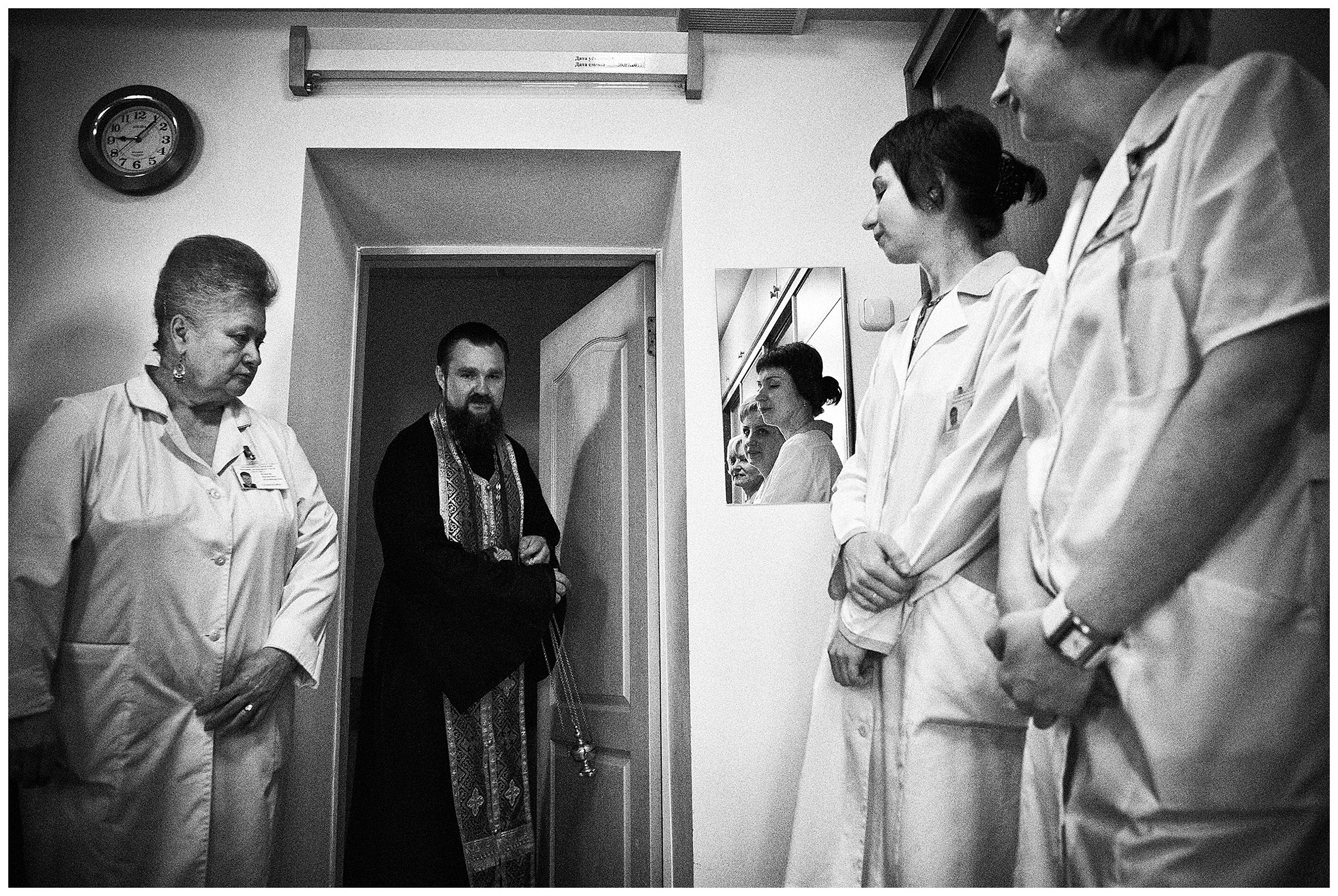 Minsk Hospice, Minsk, Belarus. A Russian Orthodox priest comes several times a week to visit the staff and patients.
