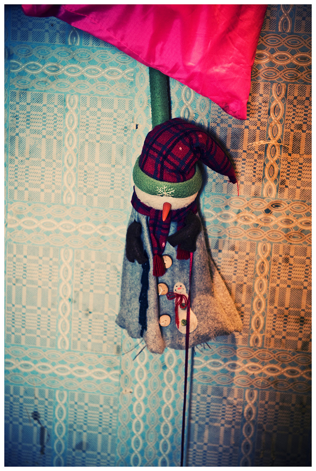 Saint Petersburg, Russia. A toy of the daughter of a Georgian guest worker hangs on the wall of a rented apartment.