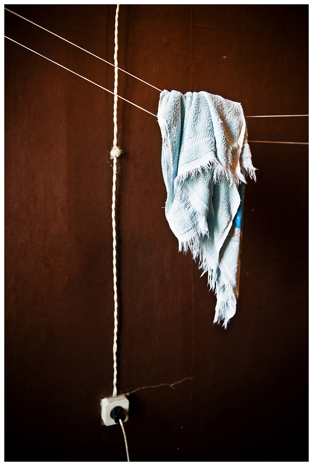 Saint Petersburg, Russia. A towel is hanging in the bathroom of the rented apartment of usbeck and georgian guest workers.