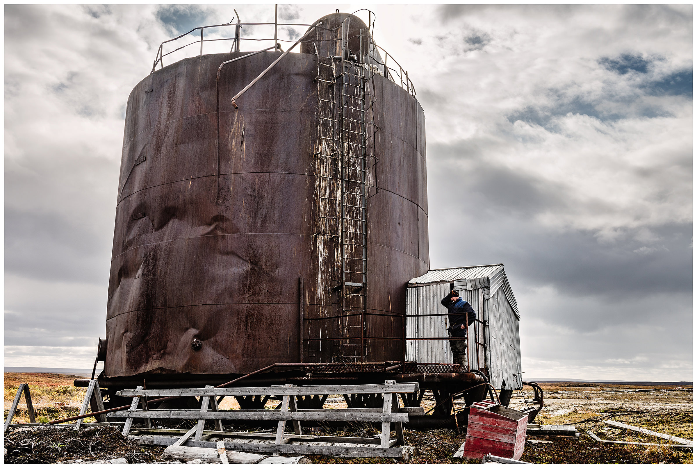 Nenets Autonomous Okrug, Komi Republic, Russia. Komi nomads gather in the tundra garbage that oil field workers have left behind.