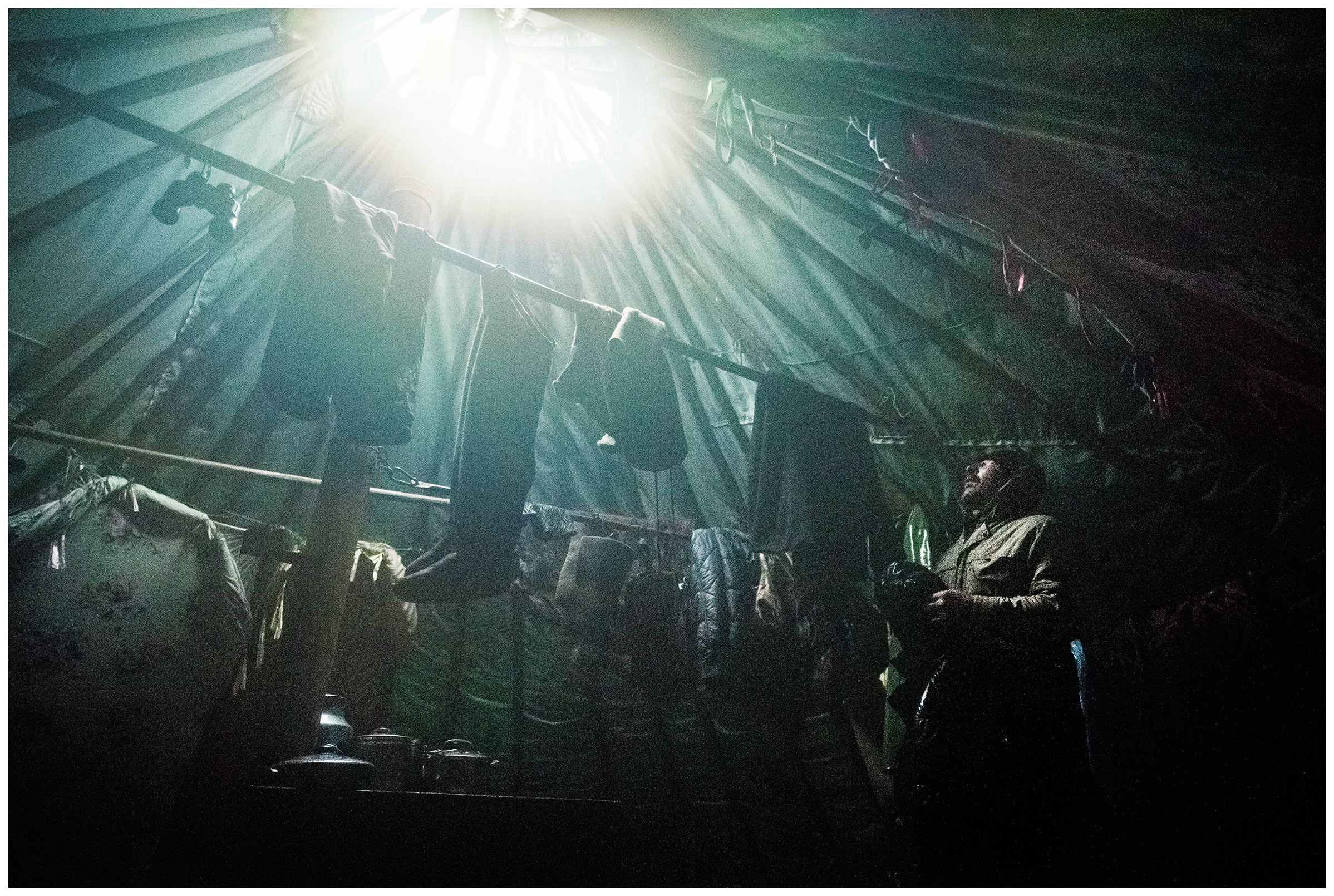 Nenets Autonomous Okrug, Komi Republic, Russia. Reindeer herders dry their clothes after a heavy rain.