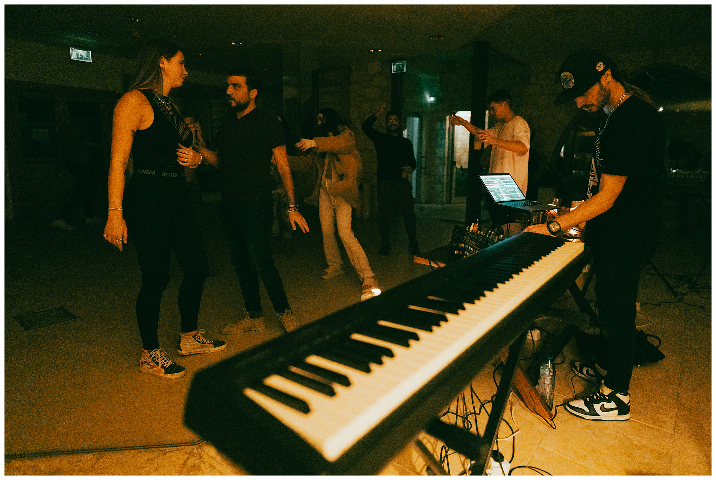 Miliou, Cyprus. Young Israelis dance to rave music late in the evening at the Secret Forest wellness retreat.